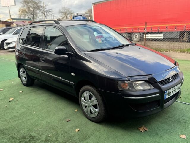 Черный Мицубиси Спейс Стар, объемом двигателя 1.8 л и пробегом 190 тыс. км за 3250 $, фото 1 на Automoto.ua