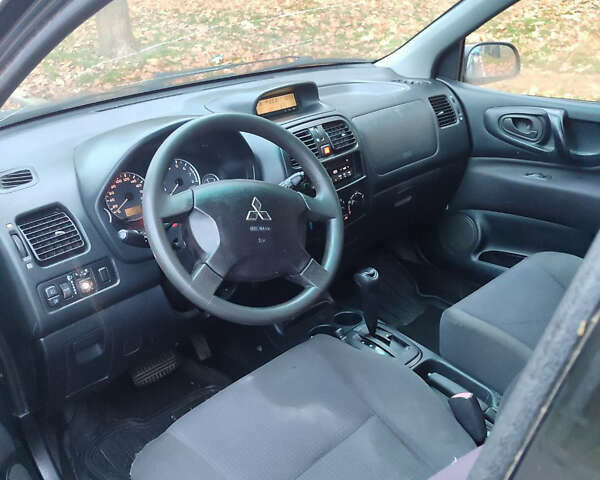 Черный Мицубиси Спейс Стар, объемом двигателя 1.9 л и пробегом 401 тыс. км за 3200 $, фото 3 на Automoto.ua