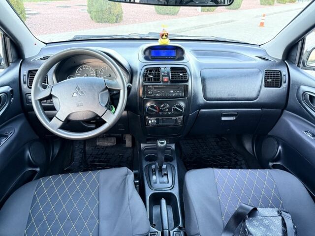 Черный Мицубиси Спейс Стар, объемом двигателя 1.8 л и пробегом 190 тыс. км за 3250 $, фото 5 на Automoto.ua