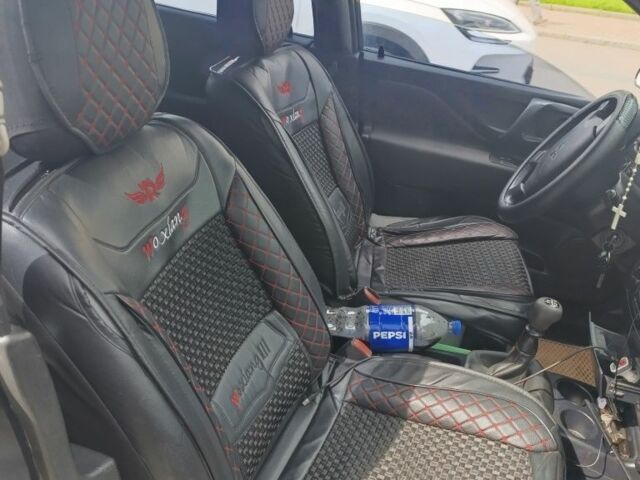 Черный Мицубиси Спейс Стар, объемом двигателя 1.6 л и пробегом 210 тыс. км за 2000 $, фото 3 на Automoto.ua