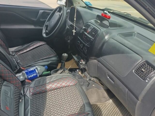 Черный Мицубиси Спейс Стар, объемом двигателя 1.6 л и пробегом 210 тыс. км за 2000 $, фото 4 на Automoto.ua