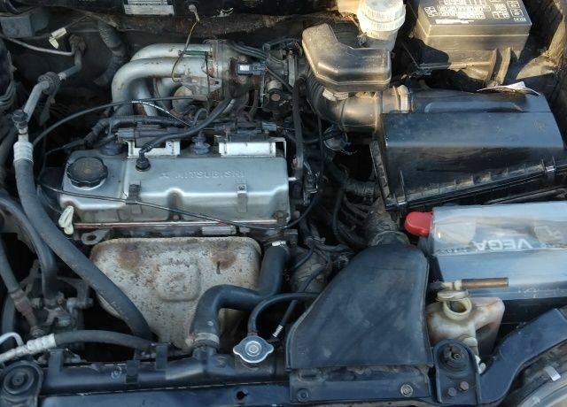 Черный Мицубиси Спейс Стар, объемом двигателя 1.6 л и пробегом 360 тыс. км за 2800 $, фото 12 на Automoto.ua