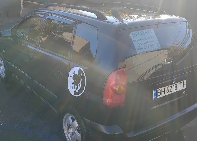 Черный Мицубиси Спейс Стар, объемом двигателя 1.6 л и пробегом 360 тыс. км за 2800 $, фото 2 на Automoto.ua