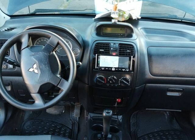 Черный Мицубиси Спейс Стар, объемом двигателя 1.6 л и пробегом 360 тыс. км за 2800 $, фото 10 на Automoto.ua
