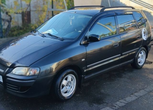 Черный Мицубиси Спейс Стар, объемом двигателя 1.6 л и пробегом 360 тыс. км за 2800 $, фото 7 на Automoto.ua