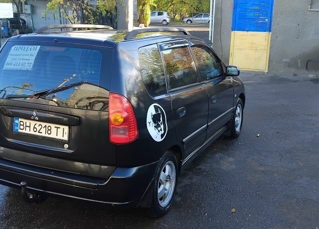 Черный Мицубиси Спейс Стар, объемом двигателя 1.6 л и пробегом 360 тыс. км за 2800 $, фото 3 на Automoto.ua