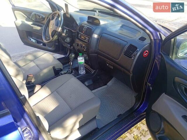 Фиолетовый Мицубиси Спейс Стар, объемом двигателя 1.58 л и пробегом 240 тыс. км за 3500 $, фото 4 на Automoto.ua