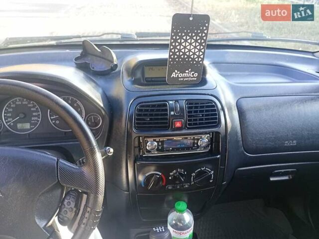 Фиолетовый Мицубиси Спейс Стар, объемом двигателя 1.58 л и пробегом 240 тыс. км за 3500 $, фото 11 на Automoto.ua