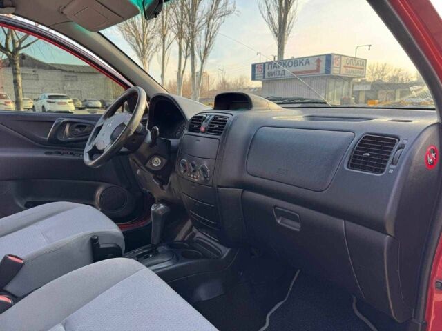 Мицубиси Спейс Стар 2002 в Днепре (Днепропетровске) на Automoto.ua Красный Мицубиси Спейс Стар, объемом двигателя 1.6 л и пробегом 177 тыс. км за 5200 $, фото 11 на Automoto.ua