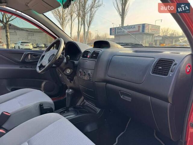 Червоний Міцубісі Спейс Стар, об'ємом двигуна 1.59 л та пробігом 177 тис. км за 5200 $, фото 9 на Automoto.ua