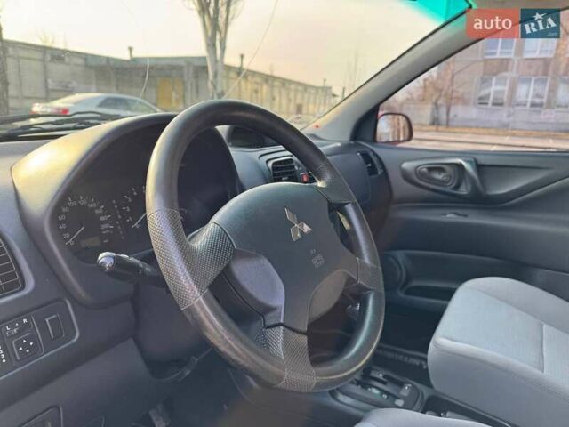 Красный Мицубиси Спейс Стар, объемом двигателя 1.59 л и пробегом 177 тыс. км за 5200 $, фото 17 на Automoto.ua