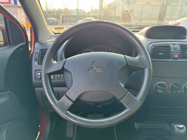 Мицубиси Спейс Стар 2002 в Днепре (Днепропетровске) на Automoto.ua Красный Мицубиси Спейс Стар, объемом двигателя 1.6 л и пробегом 177 тыс. км за 5200 $, фото 13 на Automoto.ua
