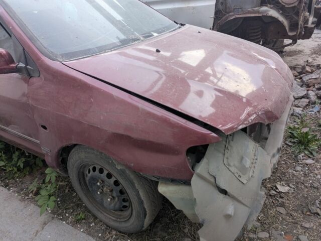 Красный Мицубиси Спейс Стар, объемом двигателя 1.6 л и пробегом 300 тыс. км за 1000 $, фото 4 на Automoto.ua