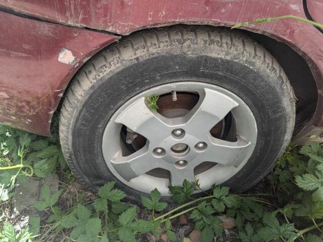 Красный Мицубиси Спейс Стар, объемом двигателя 1.6 л и пробегом 300 тыс. км за 1000 $, фото 7 на Automoto.ua