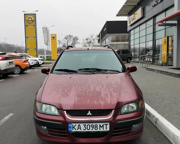 Красный Мицубиси Спейс Стар, объемом двигателя 1.83 л и пробегом 295 тыс. км за 3500 $, фото 5 на Automoto.ua
