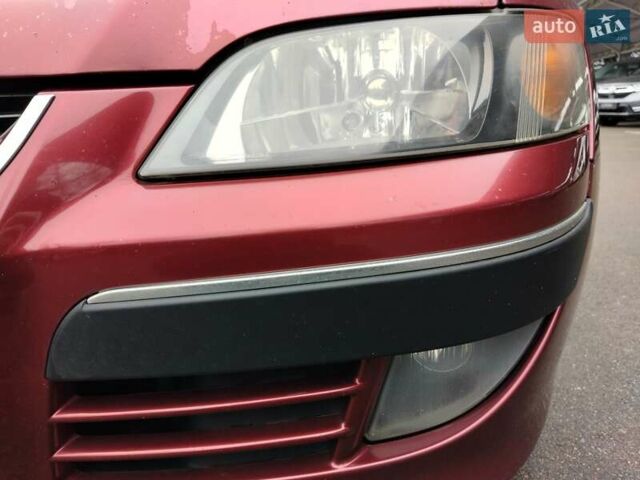 Красный Мицубиси Спейс Стар, объемом двигателя 1.83 л и пробегом 295 тыс. км за 3500 $, фото 14 на Automoto.ua