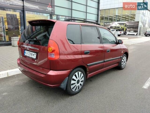 Красный Мицубиси Спейс Стар, объемом двигателя 1.83 л и пробегом 295 тыс. км за 3500 $, фото 2 на Automoto.ua