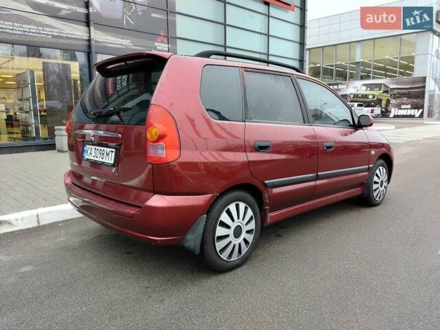 Красный Мицубиси Спейс Стар, объемом двигателя 1.83 л и пробегом 295 тыс. км за 3500 $, фото 3 на Automoto.ua