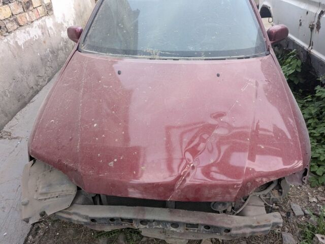 Красный Мицубиси Спейс Стар, объемом двигателя 1.6 л и пробегом 300 тыс. км за 1000 $, фото 5 на Automoto.ua