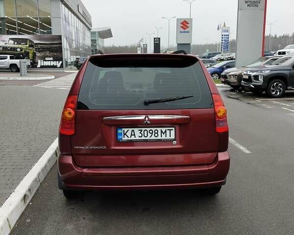 Красный Мицубиси Спейс Стар, объемом двигателя 1.83 л и пробегом 295 тыс. км за 3500 $, фото 6 на Automoto.ua
