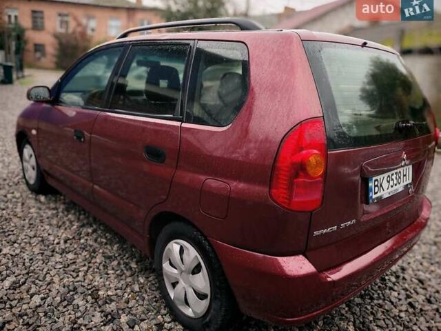 Міцубісі Спейс Стар 2004 у Бердичеве на Automoto.ua Червоний Міцубісі Спейс Стар, об'ємом двигуна 1.6 л та пробігом 200 тис. км за 2700 $, фото 5 на Automoto.ua