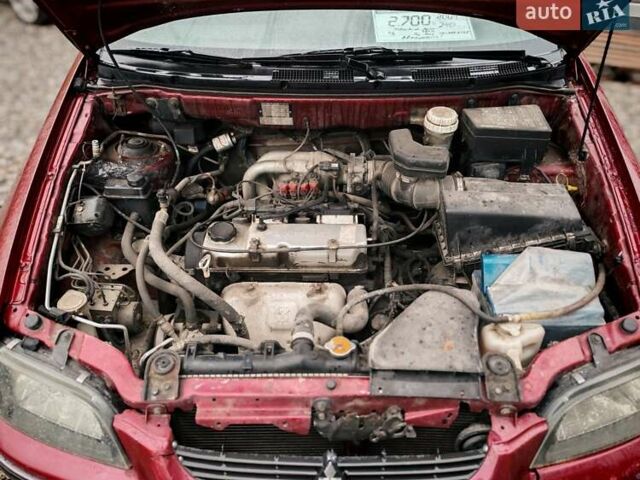 Міцубісі Спейс Стар 2004 у Бердичеве на Automoto.ua Червоний Міцубісі Спейс Стар, об'ємом двигуна 1.6 л та пробігом 200 тис. км за 2700 $, фото 18 на Automoto.ua