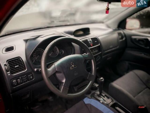 Міцубісі Спейс Стар 2004 у Бердичеве на Automoto.ua Червоний Міцубісі Спейс Стар, об'ємом двигуна 1.6 л та пробігом 200 тис. км за 2700 $, фото 15 на Automoto.ua