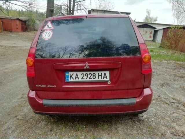 Красный Мицубиси Спейс Стар, объемом двигателя 1.6 л и пробегом 300 тыс. км за 2799 $, фото 2 на Automoto.ua