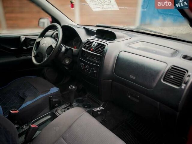 Міцубісі Спейс Стар 2004 у Бердичеве на Automoto.ua Червоний Міцубісі Спейс Стар, об'ємом двигуна 1.6 л та пробігом 200 тис. км за 2700 $, фото 12 на Automoto.ua