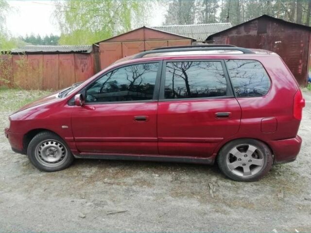 Красный Мицубиси Спейс Стар, объемом двигателя 1.6 л и пробегом 300 тыс. км за 2799 $, фото 3 на Automoto.ua
