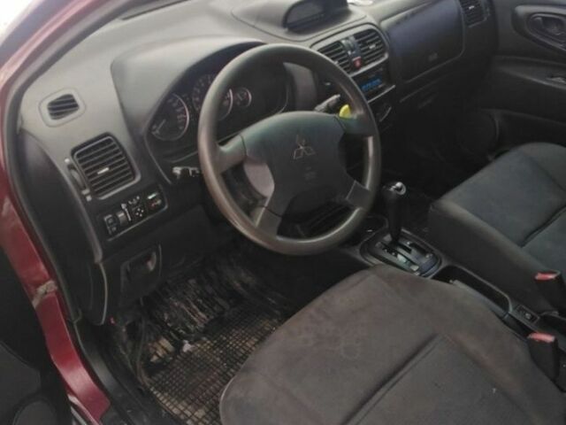 Красный Мицубиси Спейс Стар, объемом двигателя 1.6 л и пробегом 300 тыс. км за 2799 $, фото 1 на Automoto.ua