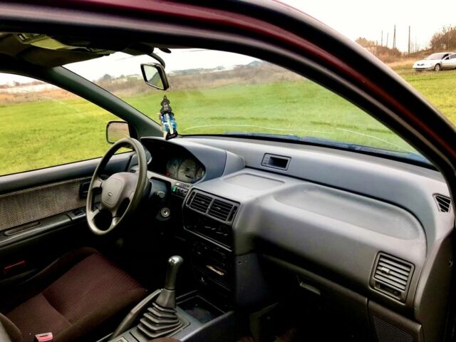 Красный Мицубиси Спейс Стар, объемом двигателя 2 л и пробегом 400 тыс. км за 900 $, фото 3 на Automoto.ua