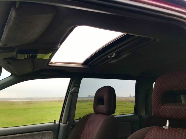 Красный Мицубиси Спейс Стар, объемом двигателя 2 л и пробегом 400 тыс. км за 900 $, фото 6 на Automoto.ua