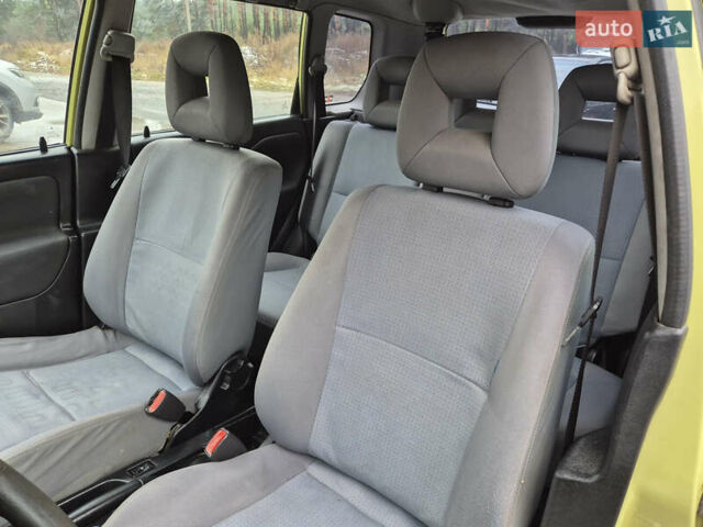 Жовтий Міцубісі Спейс Стар, об'ємом двигуна 1.58 л та пробігом 245 тис. км за 2250 $, фото 6 на Automoto.ua