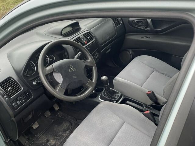 Серый Мицубиси Спейс Стар, объемом двигателя 1.6 л и пробегом 295 тыс. км за 2750 $, фото 10 на Automoto.ua