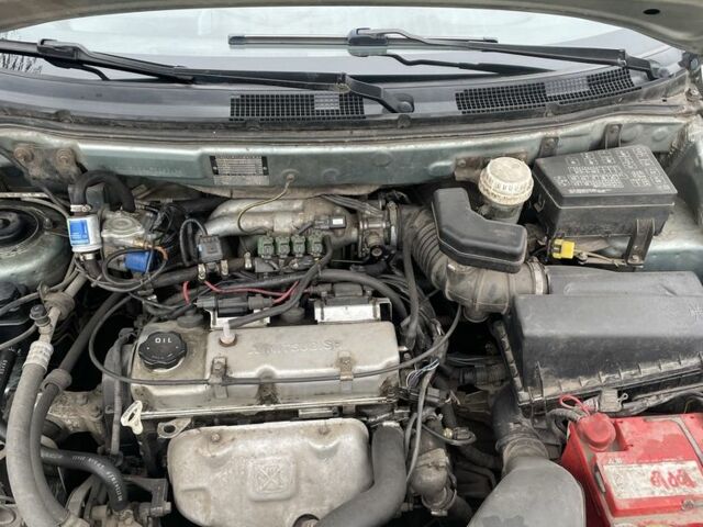 Серый Мицубиси Спейс Стар, объемом двигателя 1.6 л и пробегом 295 тыс. км за 2750 $, фото 17 на Automoto.ua