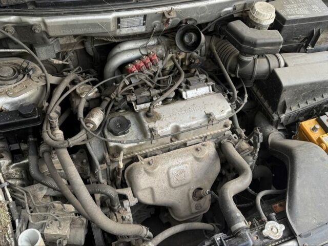 Сірий Міцубісі Спейс Стар, об'ємом двигуна 1.6 л та пробігом 150 тис. км за 850 $, фото 2 на Automoto.ua