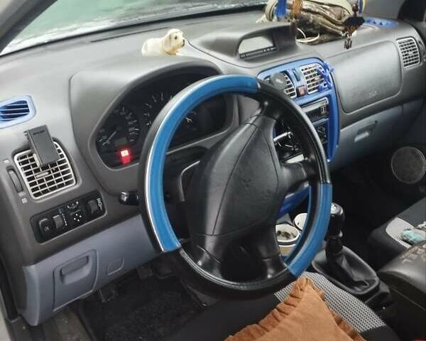 Серый Мицубиси Спейс Стар, объемом двигателя 1.3 л и пробегом 196 тыс. км за 2500 $, фото 4 на Automoto.ua