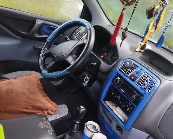 Серый Мицубиси Спейс Стар, объемом двигателя 1.3 л и пробегом 196 тыс. км за 2500 $, фото 6 на Automoto.ua