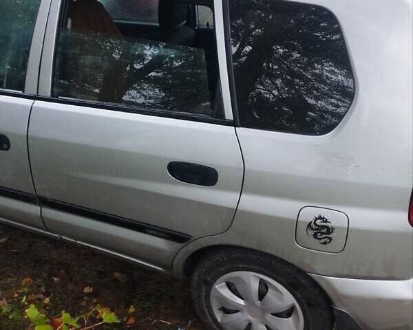 Серый Мицубиси Спейс Стар, объемом двигателя 1.3 л и пробегом 196 тыс. км за 2500 $, фото 2 на Automoto.ua