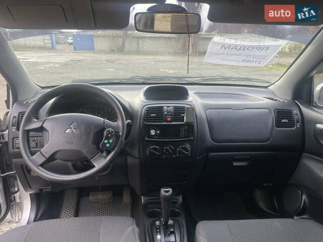 Серый Мицубиси Спейс Стар, объемом двигателя 1.58 л и пробегом 180 тыс. км за 3700 $, фото 6 на Automoto.ua
