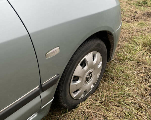 Сірий Міцубісі Спейс Стар, об'ємом двигуна 1.58 л та пробігом 295 тис. км за 2750 $, фото 7 на Automoto.ua