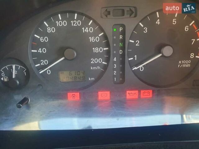 Серый Мицубиси Спейс Стар, объемом двигателя 1.6 л и пробегом 204 тыс. км за 1500 $, фото 4 на Automoto.ua