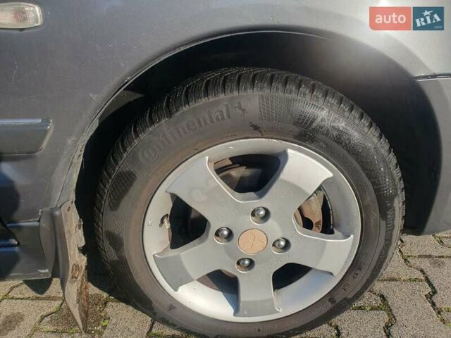 Серый Мицубиси Спейс Стар, объемом двигателя 1.6 л и пробегом 204 тыс. км за 1500 $, фото 10 на Automoto.ua