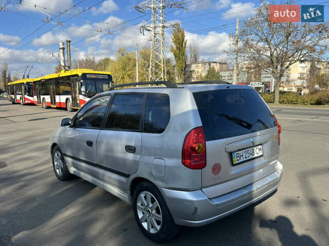 Сірий Міцубісі Спейс Стар, об'ємом двигуна 1.6 л та пробігом 200 тис. км за 1999 $, фото 3 на Automoto.ua