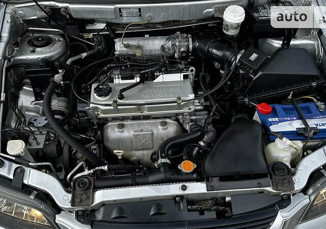 Сірий Міцубісі Спейс Стар, об'ємом двигуна 1.8 л та пробігом 210 тис. км за 5200 $, фото 12 на Automoto.ua