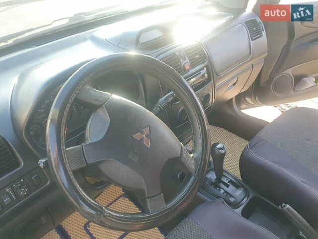 Серый Мицубиси Спейс Стар, объемом двигателя 1.6 л и пробегом 204 тыс. км за 1500 $, фото 6 на Automoto.ua