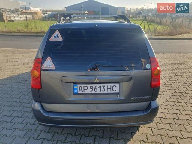 Серый Мицубиси Спейс Стар, объемом двигателя 1.6 л и пробегом 204 тыс. км за 1500 $, фото 1 на Automoto.ua