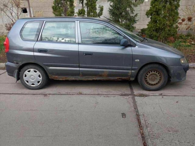 Серый Мицубиси Спейс Стар, объемом двигателя 1.6 л и пробегом 170 тыс. км за 1350 $, фото 1 на Automoto.ua