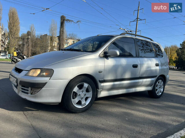 Сірий Міцубісі Спейс Стар, об'ємом двигуна 1.6 л та пробігом 200 тис. км за 1999 $, фото 2 на Automoto.ua